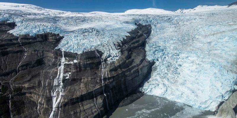 An aerial shot of an Alaskan glacier