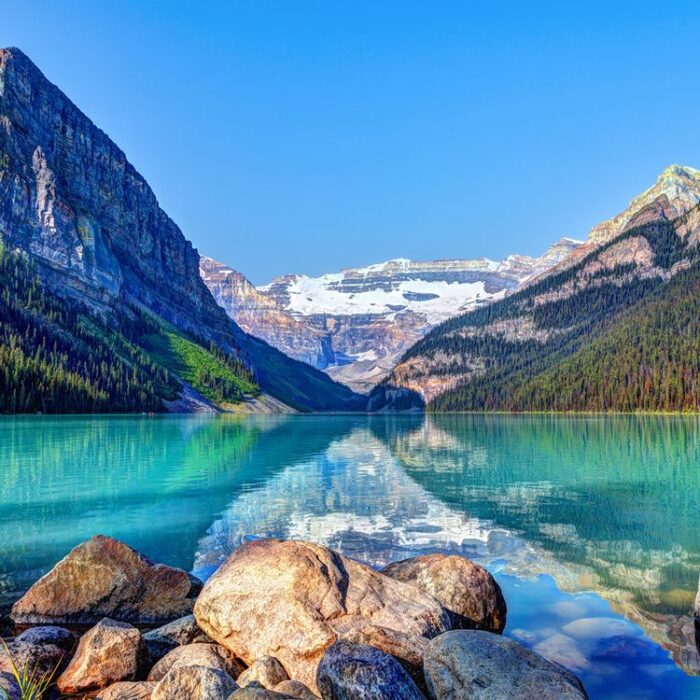More towering mountains and another emerald lake