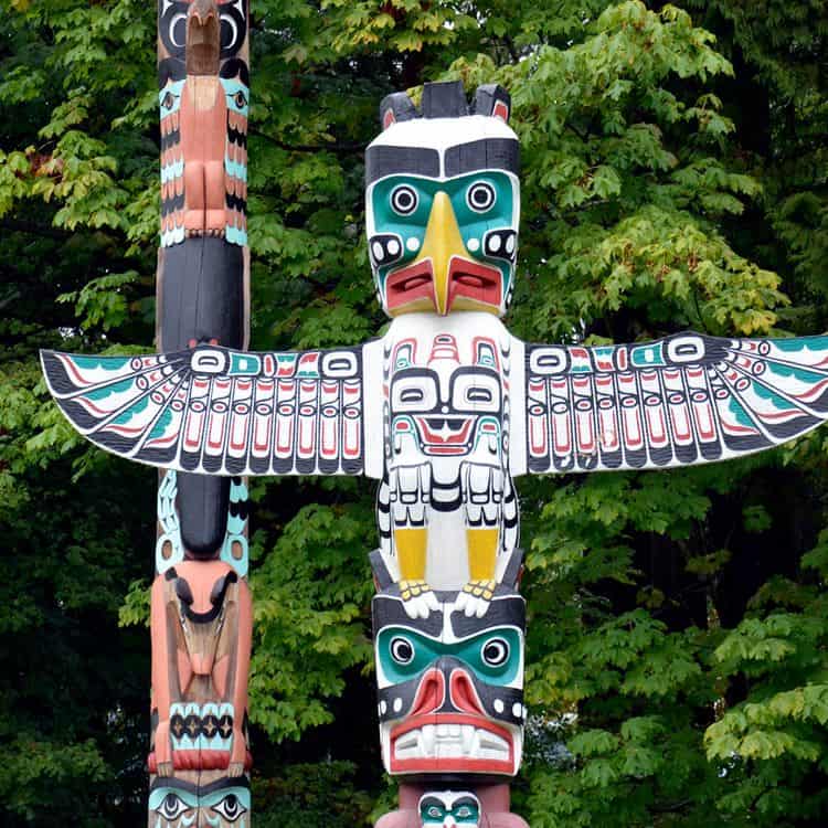 A close up of the totem poles in Stanley Park
